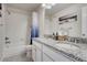 Bathroom featuring dual sinks and shower with tub at 3793 Cadence Dr, Castle Rock, CO 80109