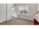 Bedroom featuring carpet, a closet, and a window, providing ample storage and natural light at 3793 Cadence Dr, Castle Rock, CO 80109