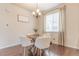 Cozy dining area with modern lighting and a round table at 3793 Cadence Dr, Castle Rock, CO 80109