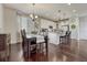 Charming dining area adjacent to the kitchen, creating an inviting space for meals and gatherings at 3793 Cadence Dr, Castle Rock, CO 80109