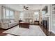 Cozy living room features fireplace and mantle with shelving at 3793 Cadence Dr, Castle Rock, CO 80109