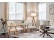Bright living room features modern furniture, stylish decor, and hardwood floors at 3793 Cadence Dr, Castle Rock, CO 80109