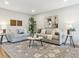 Comfortable living room featuring stylish sofas and a decorative rug at 5553 S Datura St, Littleton, CO 80120