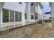 House exterior view with patio and surrounding unfinished yard at 918 Promenade Dr, Superior, CO 80027