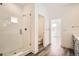Bathroom featuring a glass shower with white subway tile and bronze fixtures at 918 Promenade Dr, Superior, CO 80027