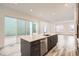 Bright kitchen featuring a center island and stainless steel appliances, sliding door to the outside at 918 Promenade Dr, Superior, CO 80027