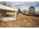 Spacious backyard with a covered patio at 1150 S Taos Way, Denver, CO 80223