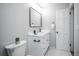 Renovated bathroom with a modern vanity and a decorative cactus accent at 1150 S Taos Way, Denver, CO 80223