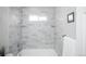 Bathroom with a shower, and a window at 1150 S Taos Way, Denver, CO 80223