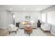 Inviting living room with neutral tones, comfortable seating, and bright natural light, perfect for relaxation at 1150 S Taos Way, Denver, CO 80223