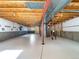 Unfinished basement with painted floor and exposed ductwork and framing offering customization potential at 542 Hawthorn Cir, Frederick, CO 80530