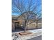Inviting home exterior with attached garage, stone accents, manicured lawn, and charming curb appeal at 11257 W Radcliffe Dr, Littleton, CO 80127