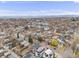 A beautiful view shows a neighborhood lined with houses and lush greenery at 3948 Wyandot St, Denver, CO 80211