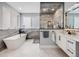 Spa-like bathroom with a soaking tub, walk-in shower, and luxurious finishes at 3948 Wyandot St, Denver, CO 80211