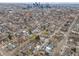 A birds eye view of a beautiful neighborhood with city skyline in the distance at 3948 Wyandot St, Denver, CO 80211