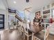 Elegant dining room featuring a modern light fixture, wine rack, and stylish decor at 3948 Wyandot St, Denver, CO 80211