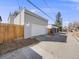 Detached garage with white door and alley access at 3948 Wyandot St, Denver, CO 80211