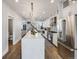 Gourmet kitchen boasting a large island, stainless steel appliances, and open layout at 3948 Wyandot St, Denver, CO 80211