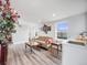 Cozy living room with modern finishes, updated windows, and a comfortable layout at 3948 Wyandot St, Denver, CO 80211