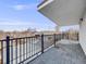 Rooftop deck has pavers and metal railing at 3948 Wyandot St, Denver, CO 80211