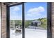 Balcony showcasing expansive views, comfortable seating, and access to outdoor space for relaxation and enjoyment at 1140 Lake Gulch Rd, Castle Rock, CO 80104