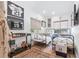 Bright bedroom with jersey decor, twin beds and herringbone floors at 1140 Lake Gulch Rd, Castle Rock, CO 80104
