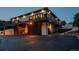 Multi-level home with a three-car garage and a spacious outdoor area, perfect for storage and entertaining at 1140 Lake Gulch Rd, Castle Rock, CO 80104