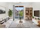Bright living room with stylish furnishings and a view of the outdoors at 4100 Albion St # 523, Denver, CO 80216