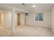 Spacious carpeted basement with a closet and natural light from a window at 10883 Otis Cir, Westminster, CO 80020
