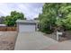 Charming home with attached garage, driveway, and landscaped front yard at 10883 Otis Cir, Westminster, CO 80020