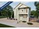 Charming two-story home featuring a covered entry, a balcony, and manicured landscaping at 13565 E 103Rd Ave, Commerce City, CO 80022