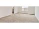 Spacious bedroom with carpet flooring and an ensuite bathroom at 5578 Inland Ave, Firestone, CO 80504