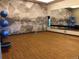 Bright exercise room with mirrors and fitness balls for yoga and stretching at 5578 Inland Ave, Firestone, CO 80504