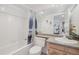 Bathroom with tiled shower and a modern sink at 7664 S Ivanhoe Way, Centennial, CO 80112