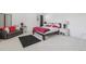 Bedroom featuring a gray couch, queen bed, and black accent rug at 7664 S Ivanhoe Way, Centennial, CO 80112