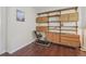 Office with wooden built-ins and plenty of shelf space at 7664 S Ivanhoe Way, Centennial, CO 80112