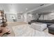Expansive basement with a cozy seating area, workspace, and open layout, offering versatile living space at 1315 Sidewinder Cir, Castle Rock, CO 80108