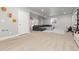 Fully finished basement with media area, playroom access, and neutral colors offering ample space and style at 1315 Sidewinder Cir, Castle Rock, CO 80108
