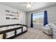 Bedroom featuring a large window and a charming reading nook at 1315 Sidewinder Cir, Castle Rock, CO 80108