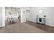 Inviting living room with an open floorplan, hardwood floors, and neutral paint at 1315 Sidewinder Cir, Castle Rock, CO 80108