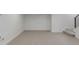 Unfinished basement area featuring neutral carpeting and ample space at 3322 W 26Th Ave, Denver, CO 80211
