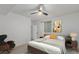 Comfortable bedroom with a ceiling fan, natural light, and contemporary decor for a peaceful atmosphere at 3322 W 26Th Ave, Denver, CO 80211
