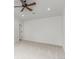 Spacious bedroom with ceiling fan and ample natural light at 3322 W 26Th Ave, Denver, CO 80211