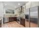 Modern kitchen features stainless steel appliances, granite counters, and a beautiful backsplash at 3322 W 26Th Ave, Denver, CO 80211