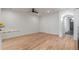 Bright living space featuring hardwood floors, white walls, and an open layout at 3322 W 26Th Ave, Denver, CO 80211
