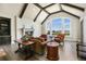 Bright and airy living room with high ceilings, large windows, a fireplace, and hardwood floors at 770 International Isle Dr, Castle Rock, CO 80108
