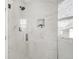 Modern bathroom with a glass shower and marble tile at 1960 S Franklin St, Denver, CO 80210