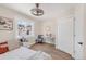 Well-lit bedroom featuring a desk, chair and neutral decor at 1960 S Franklin St, Denver, CO 80210