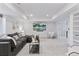 Basement featuring a large sectional sofa, modern lighting, and an entertainment center creating a comfortable space at 4094 Bimini Ct, Boulder, CO 80301