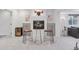Stylish basement with bar area, custom shelving, and modern decor, perfect for entertaining and relaxation at 4094 Bimini Ct, Boulder, CO 80301